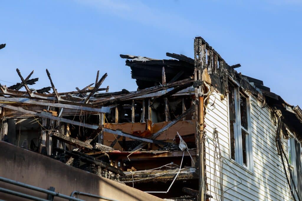 Ruins of house after big disaster - Thrive Electrical Emergency & Restoration